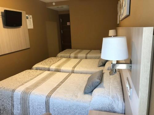 Hotel Bahiaにあるベッド