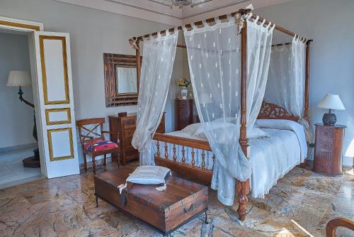 Ένα ή περισσότερα κρεβάτια σε δωμάτιο στο LA CASA DEL TEMPO