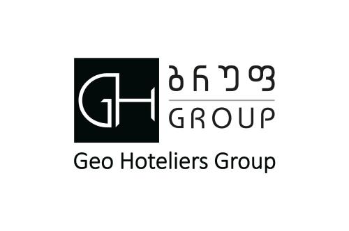 a logo for a gozo hoteliers group at Hotel Shine Palace in Tbilisi City