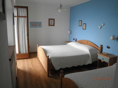 Katil atau katil-katil dalam bilik di B&B Al Ghiro