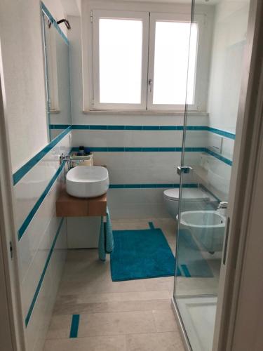Ett badrum på La casa Turchese