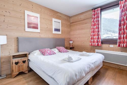 מיטה או מיטות בחדר ב-Le Paradis 27 apartment - Chamonix All Year