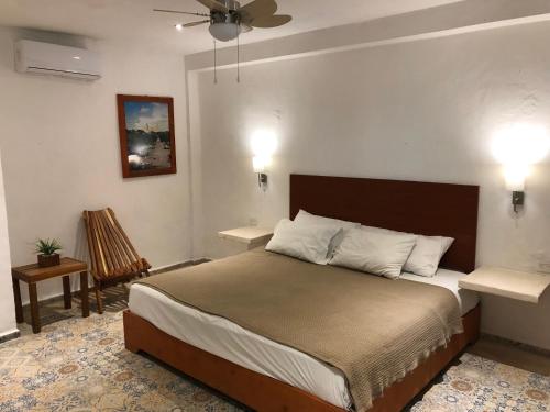 Postel nebo postele na pokoji v ubytování Hotel Casa Bamboo