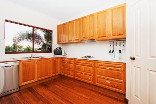 A kitchen or kitchenette at Reflections Broome