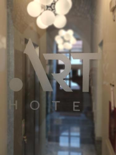 a glass door with the word x on it at ART Hotel in Sibiu