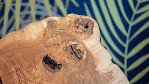 a close up of a piece of wood with holes in it at ART Hotel in Sibiu
