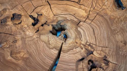 an overhead view of a wooden table with a knife at ART Hotel in Sibiu