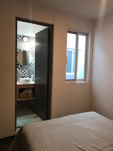 Postel nebo postele na pokoji v ubytování Casa Maye