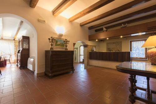 a living room with a table and a counter at Masseria Sant'Anna in Bari