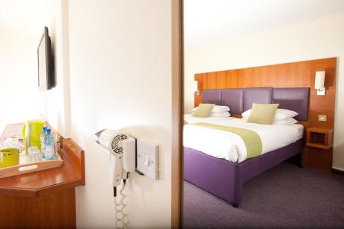 Letto o letti in una camera di Hello Hotel