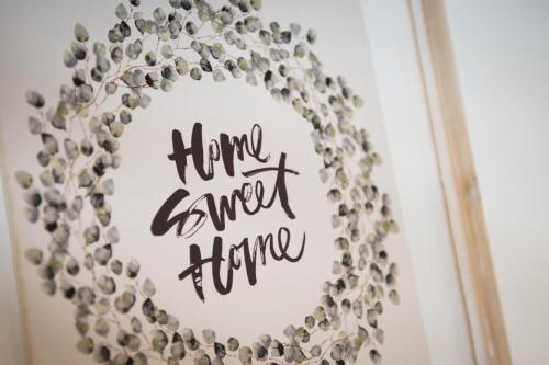 a wreath that says have sweet hope written on it at Your Home - City Apartment in Kufstein in Kufstein