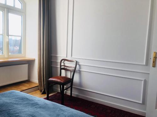 Posteľ alebo postele v izbe v ubytovaní St. Florian Apartament