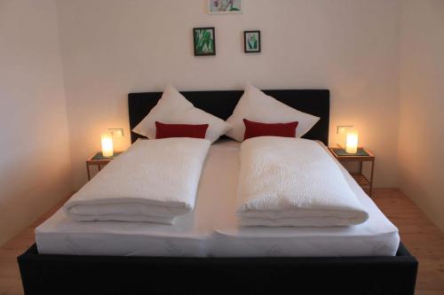 Ένα ή περισσότερα κρεβάτια σε δωμάτιο στο Herrenhaus am Grübl