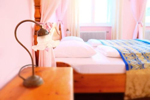 Кровать или кровати в номере Hotel Maurerhansl