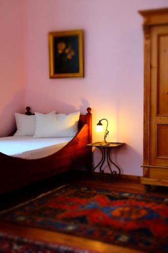 Кровать или кровати в номере Hotel Maurerhansl
