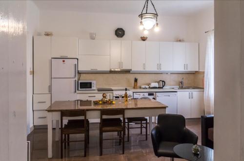 O bucătărie sau chicinetă la Apartman Natalia