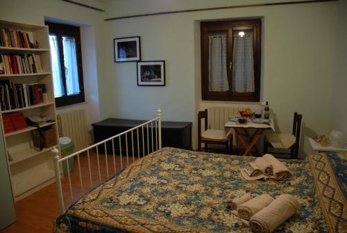 Postel nebo postele na pokoji v ubytování Fattoria Nonno Neno B&B
