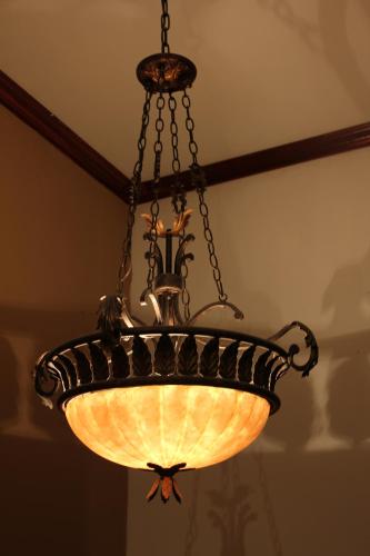 a chandelier hanging from a ceiling at Boutique Hotel Calle 20 in San José