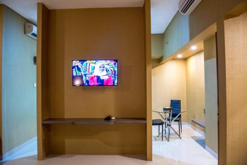 TV a/nebo společenská místnost v ubytování Grand Padis Hotel