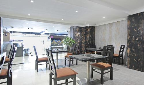 Kuchyň nebo kuchyňský kout v ubytování Itsy Hotels Jansi Residency