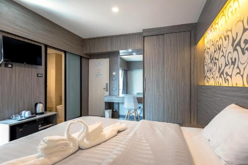 Voodi või voodid majutusasutuse Sound@sleep Hotel toas