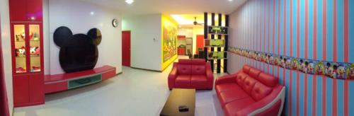 Ein Sitzbereich in der Unterkunft WindMill SunRise PaddyView Homestay