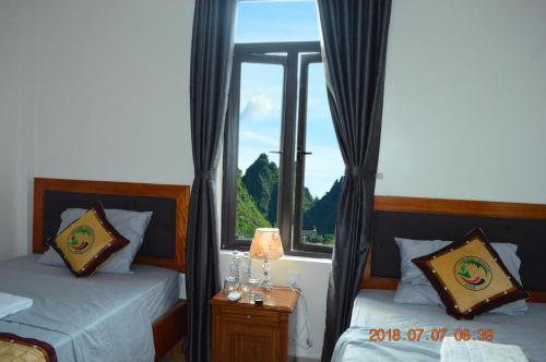 Postel nebo postele na pokoji v ubytování Son Doong Riverside