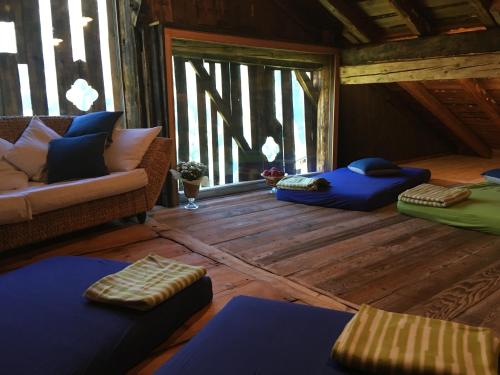 a living room with two bean bags and a couch at Ögghof 221 in Kaunertal
