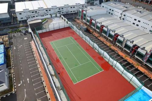 an aerial view of a tennis court in a city at Mykey The Wave A-23-15 Melaka City in Melaka