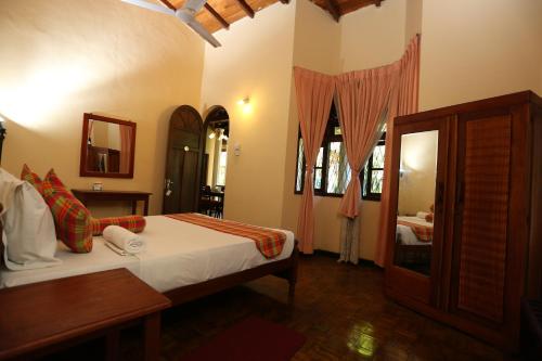 Katil atau katil-katil dalam bilik di Tree Breeze Inn