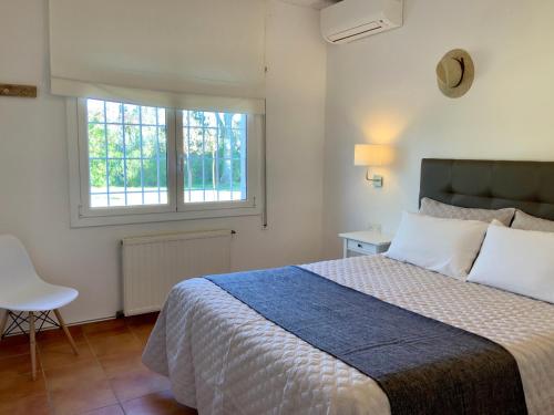 Llit o llits en una habitació de Villa Casa del Hort, Private Pool & Garden