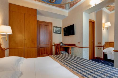 Katil atau katil-katil dalam bilik di Hotel Amalfi