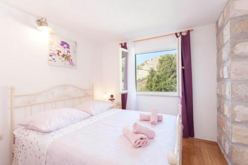 Posteľ alebo postele v izbe v ubytovaní Holiday house Layla in Tucepi, sea view