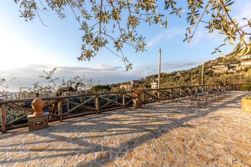 a bridge over a river with a hill in the background at Maison Bon Bon in Sorrento