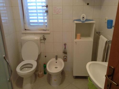 Koupelna v ubytování Apartments Bosiljka