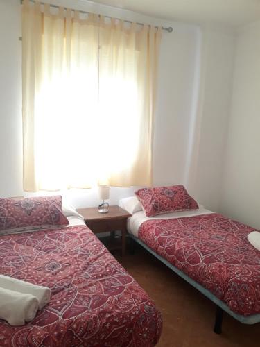 Ένα ή περισσότερα κρεβάτια σε δωμάτιο στο MAIN SQUARE Apartments