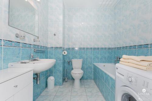 Kúpeľňa v ubytovaní Jantar Apartamenty - Park Side