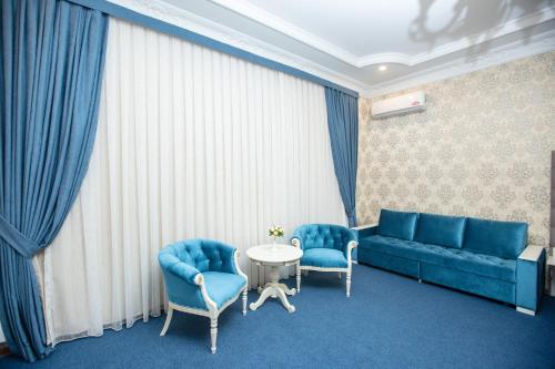 Χώρος καθιστικού στο Mirzo Boutique Hotel