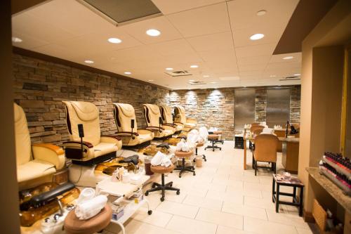 a salon with a row of chairs and a waiting room at Pillar and Post Inn & Spa in Niagara-on-the-Lake