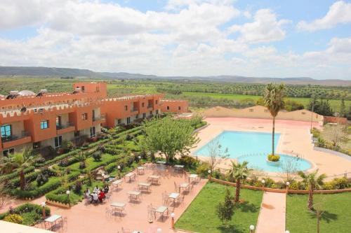 an aerial view of a resort with a swimming pool at H&ocirc;tel Relais Saiss in Sefrou