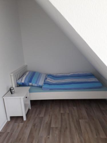 Postel nebo postele na pokoji v ubytování Ferienwohnung Küper