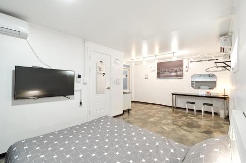 Μια τηλεόραση ή/και κέντρο ψυχαγωγίας στο Jun Guesthouse