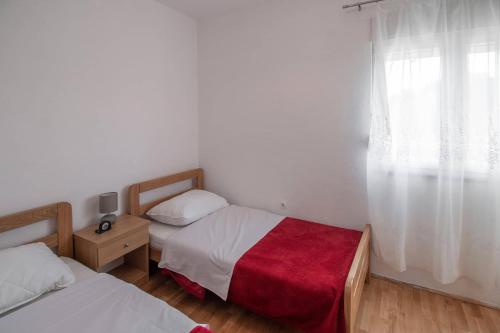 Postel nebo postele na pokoji v ubytování Blue Mate