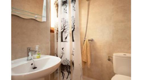 Ένα μπάνιο στο Flagship Private Villa