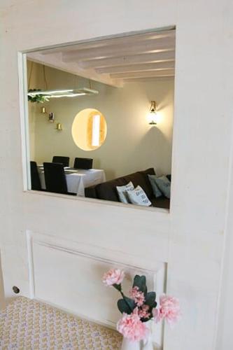 Ένα ή περισσότερα κρεβάτια σε δωμάτιο στο Quebra Costas Rooms Torres Vedras