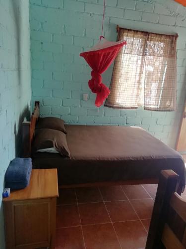 Postel nebo postele na pokoji v ubytování Cabanas chaac calakmul