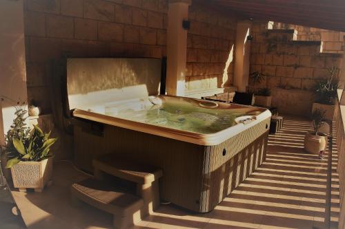 a jacuzzi tub in a room with stairs at Villa Libana in Povlja