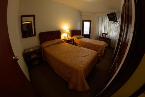 Ein Bett oder Betten in einem Zimmer der Unterkunft Hotel Incasol