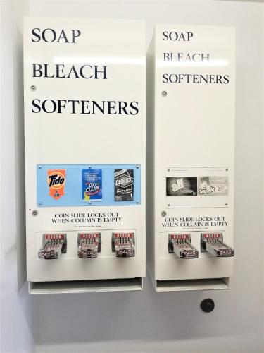 a display case for a car dealership with a soap beach southern sign at Abby Inn in Abbotsford