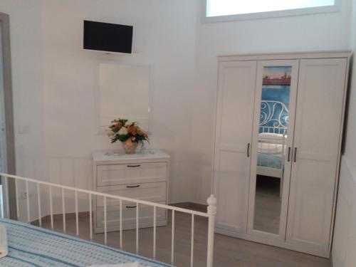 Katil atau katil-katil dalam bilik di Holiday house Lual